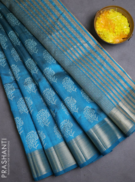 Semi raw silk saree peacock blue with allover floral butta prints and zari woven border