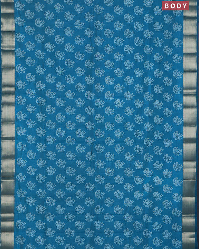 Semi raw silk saree peacock blue with allover floral butta prints and zari woven border