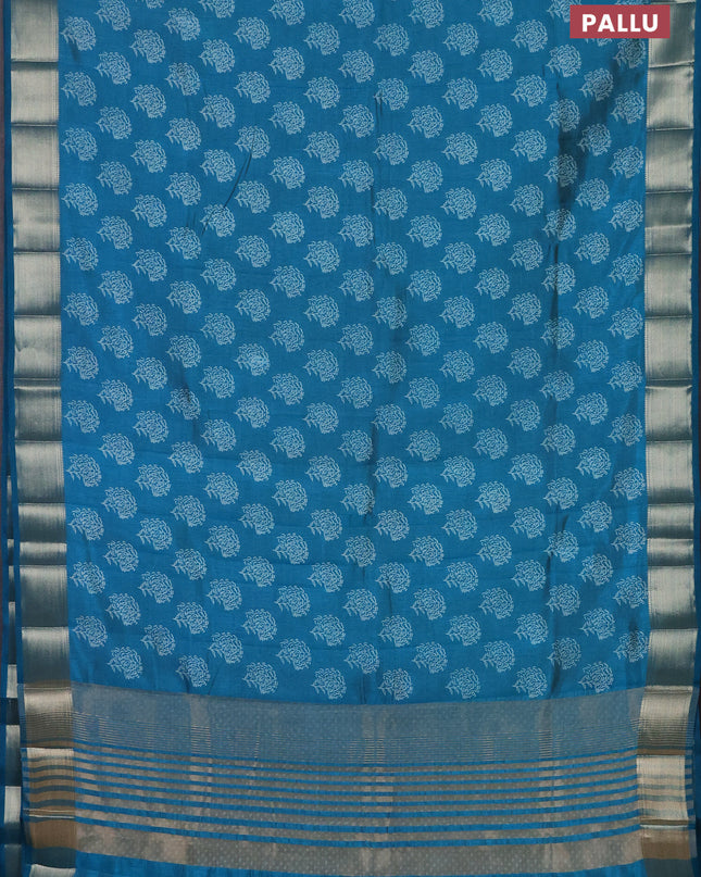 Semi raw silk saree peacock blue with allover floral butta prints and zari woven border