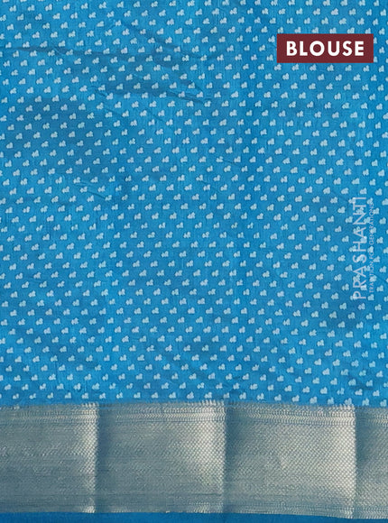 Semi raw silk saree peacock blue with allover floral butta prints and zari woven border