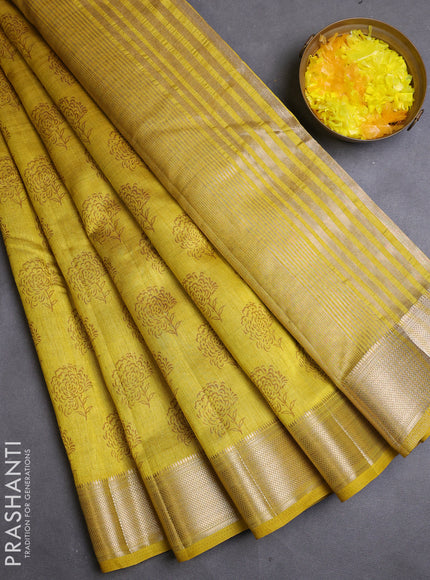 Semi raw silk saree mustard yellow with allover floral butta prints and zari woven border