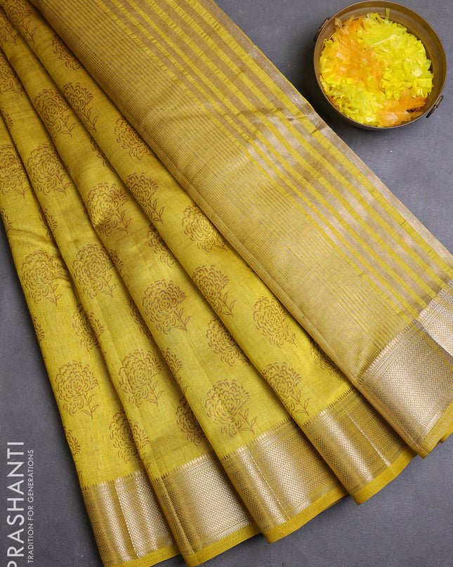 Semi raw silk saree mustard yellow with allover floral butta prints and zari woven border