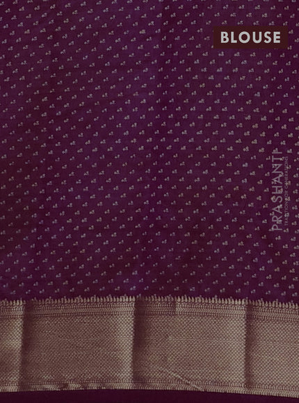 Semi raw silk saree purple with allover floral butta prints and zari woven border