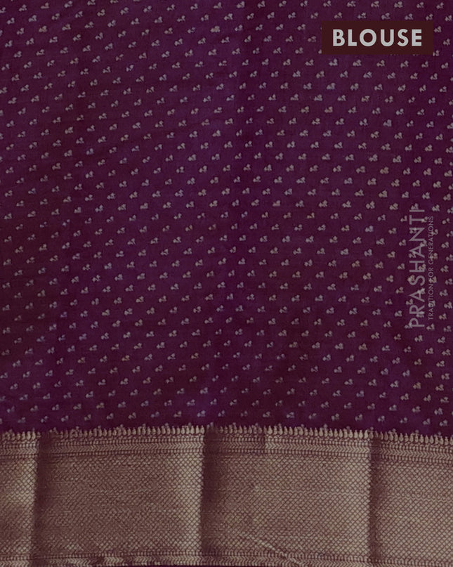 Semi raw silk saree purple with allover floral butta prints and zari woven border