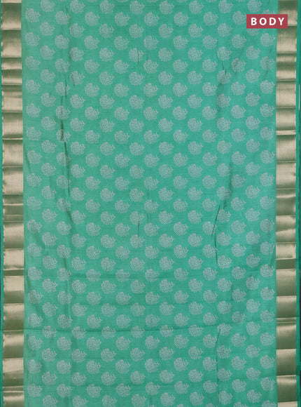 Semi raw silk saree teal green with allover floral butta prints and zari woven border