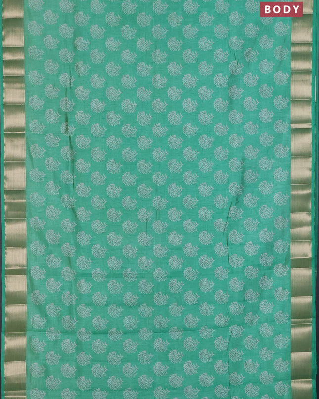 Semi raw silk saree teal green with allover floral butta prints and zari woven border