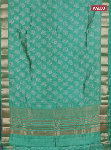 Semi raw silk saree teal green with allover floral butta prints and zari woven border