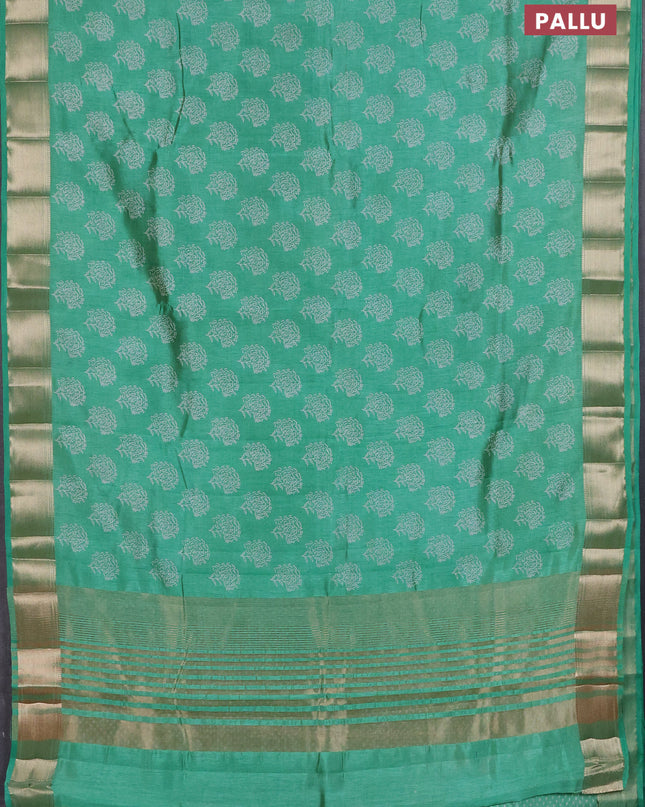 Semi raw silk saree teal green with allover floral butta prints and zari woven border