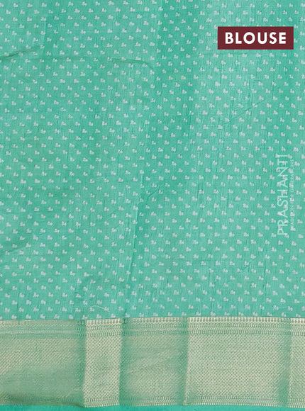 Semi raw silk saree teal green with allover floral butta prints and zari woven border