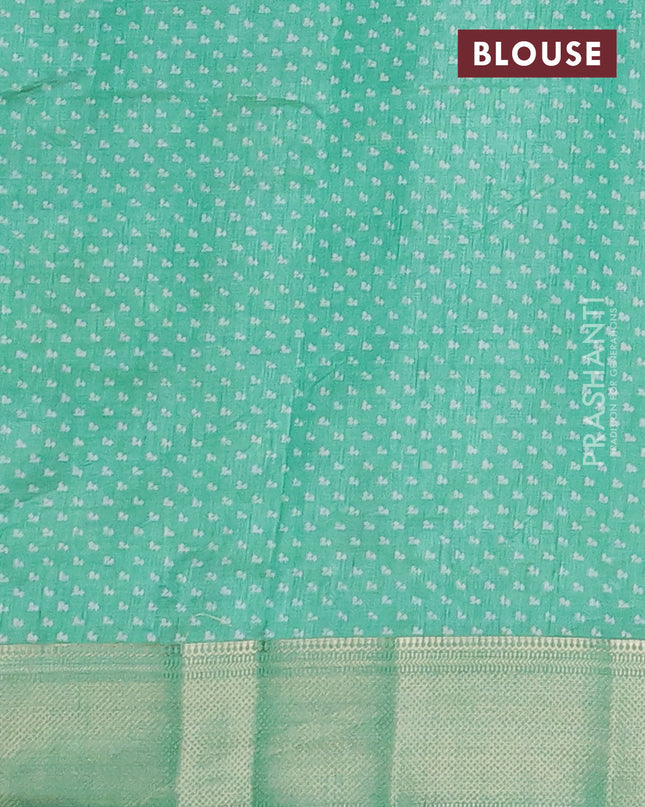 Semi raw silk saree teal green with allover floral butta prints and zari woven border