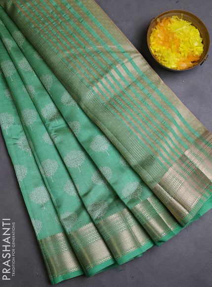 Semi raw silk saree teal green with allover butta prints and zari woven border