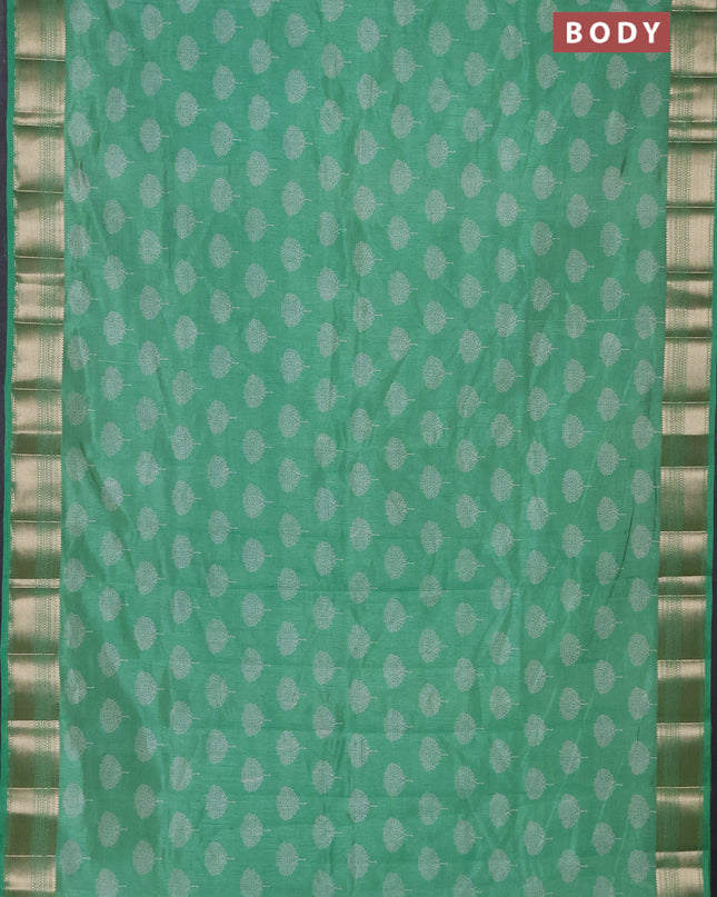 Semi raw silk saree teal green with allover butta prints and zari woven border