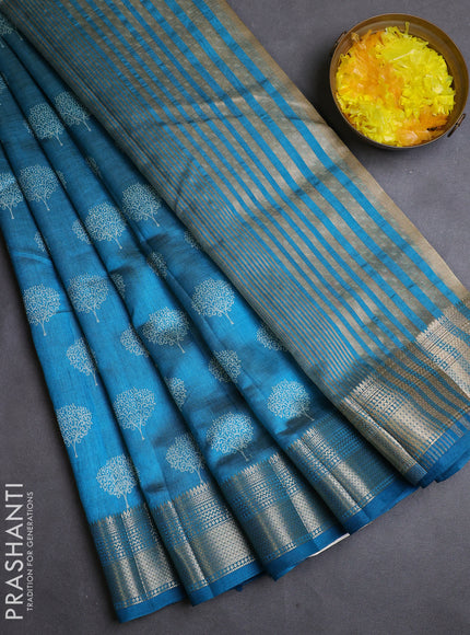 Semi raw silk saree cs blue with allover butta prints and zari woven border