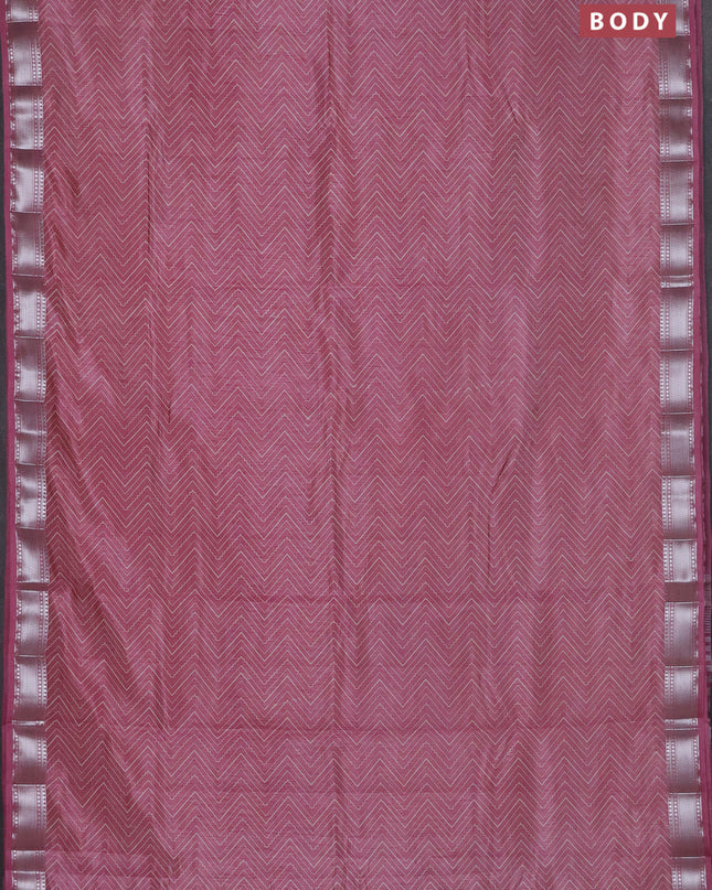Semi raw silk saree pastel pink with allover zig zag prints and zari woven border