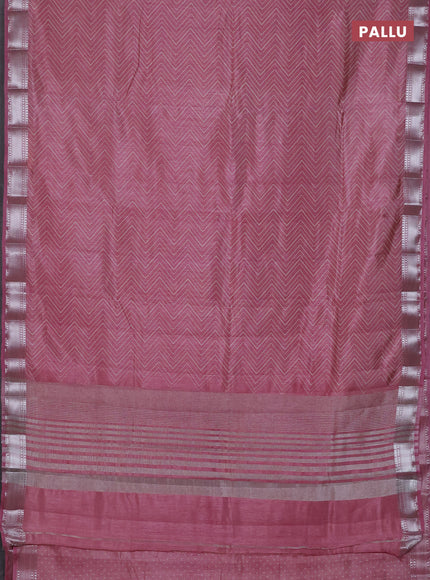Semi raw silk saree pastel pink with allover zig zag prints and zari woven border