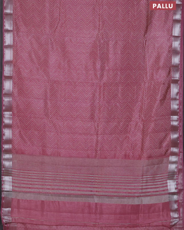 Semi raw silk saree pastel pink with allover zig zag prints and zari woven border