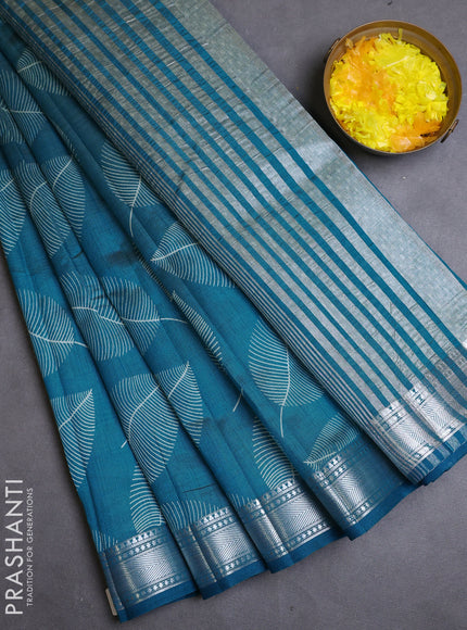 Semi raw silk saree cs blue with allover leaf butta prints and zari woven border