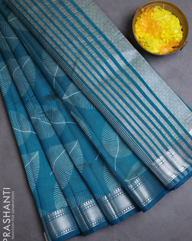 Semi raw silk saree cs blue with allover leaf butta prints and zari woven border