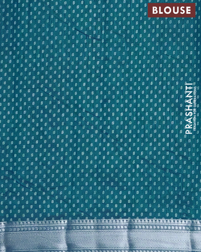 Semi raw silk saree cs blue with allover leaf butta prints and zari woven border