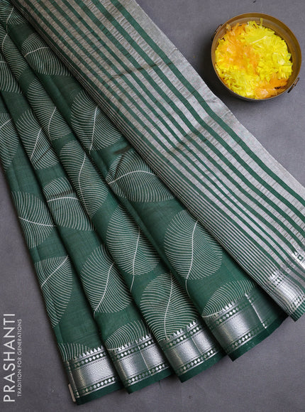 Semi raw silk saree bottle green with allover leaf butta prints and zari woven border