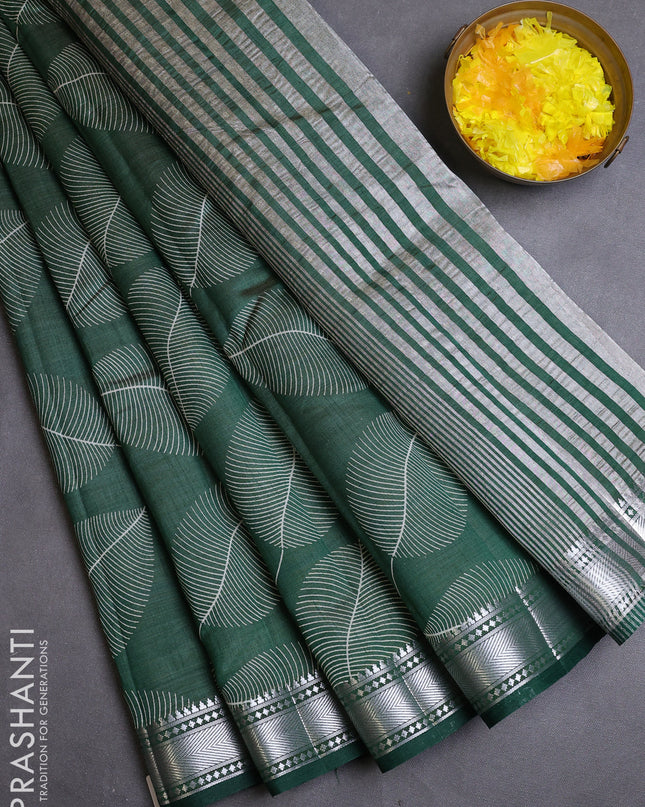 Semi raw silk saree bottle green with allover leaf butta prints and zari woven border