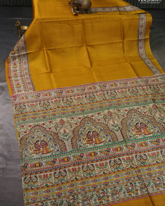 Madhubai printed silk saree mustard yellow and cream with plain body and madhubani printed border