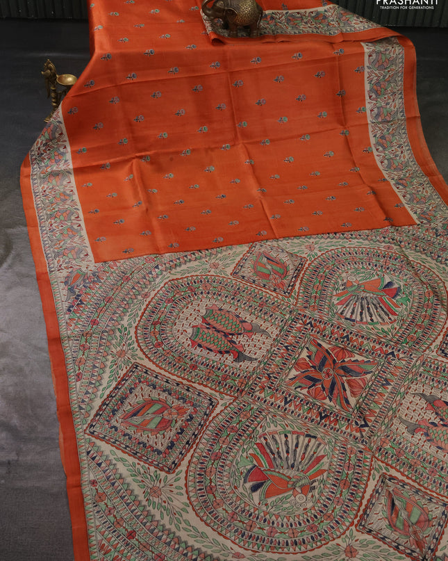Madhubai printed silk saree orange and cream with butta prints and madhubani printed border