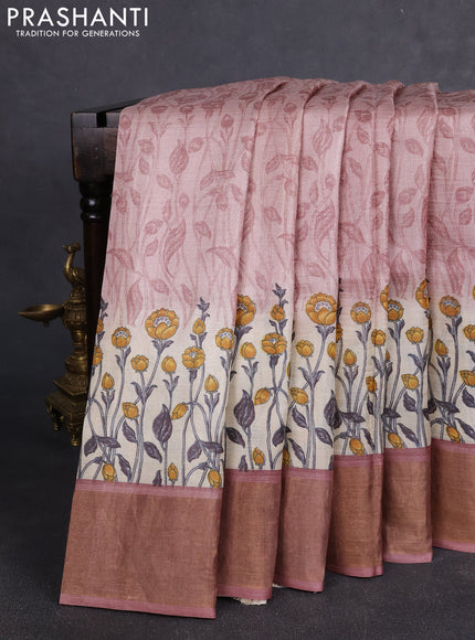 Pure tussar silk saree pastel peach and cream with allover floral prints and zari woven border