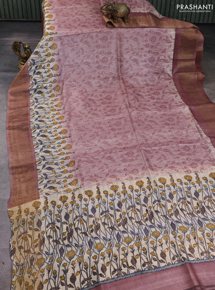 Pure tussar silk saree pastel peach and cream with allover floral prints and zari woven border