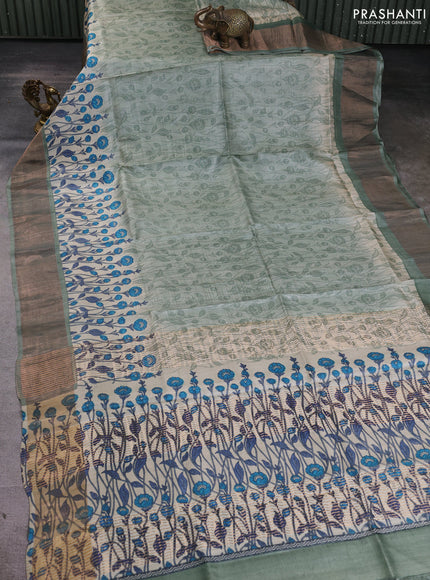 Pure tussar silk saree pastel green and cream with allover floral prints and zari woven border