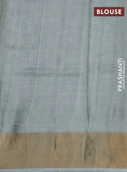 Pure tussar silk saree pastel green and cream with allover floral prints and zari woven border