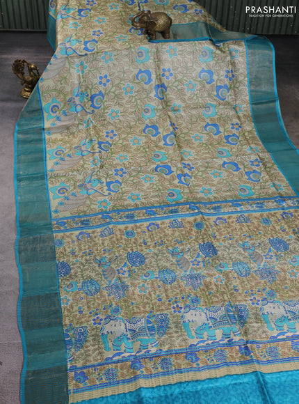 Pure tussar silk saree cream and teal blue with allover kalamkari prints and zari woven border