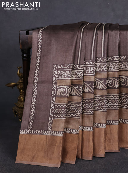 Pure tussar silk saree brown and pastel brown with allover prints and zari woven border