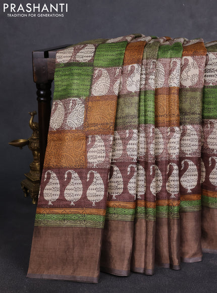 Pure tussar silk saree multi colour and brown with allover prints and zari woven border