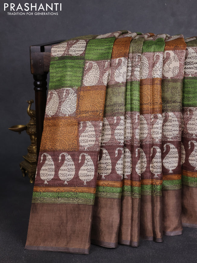 Pure tussar silk saree multi colour and brown with allover prints and zari woven border