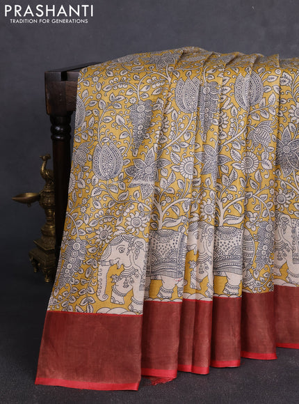 Pure tussar silk saree yellow and red with allover kalamkari prints and zari woven border