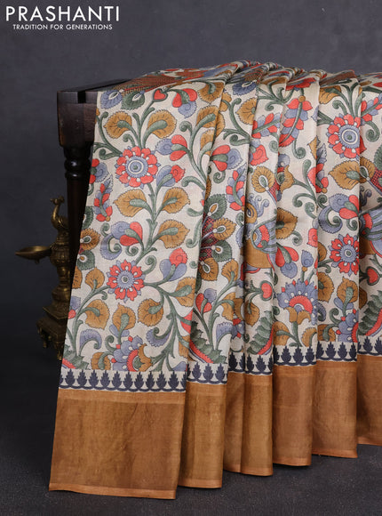 Pure tussar silk saree cream and dark sandal with allover kalamkari prints and zari woven border