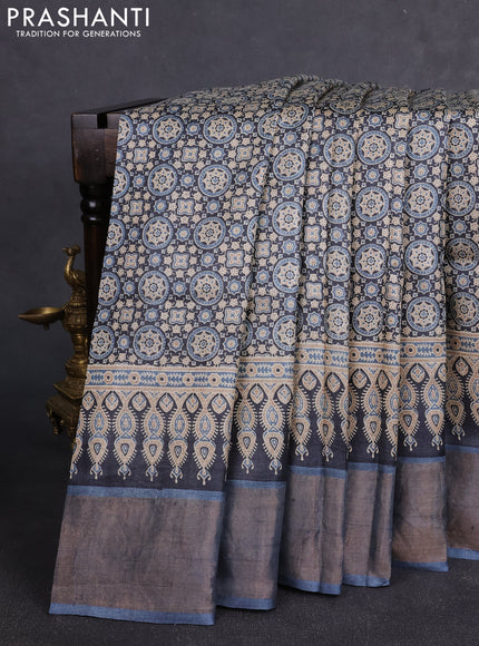 Pure tussar silk saree black and blue with allover ajrakh prints and zari woven border