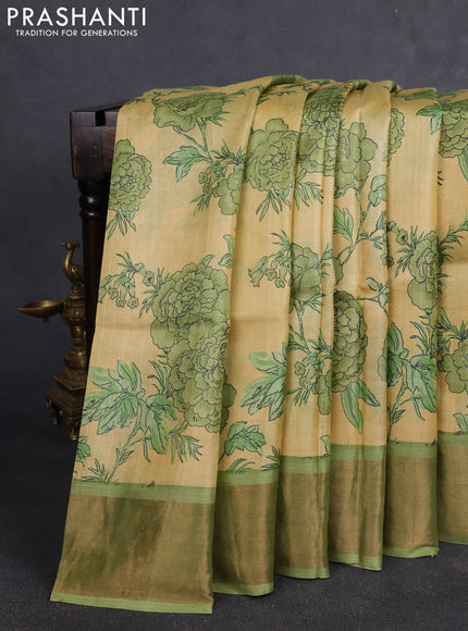 Pure tussar silk saree pale yellow and green with allover floral prints and zari woven border