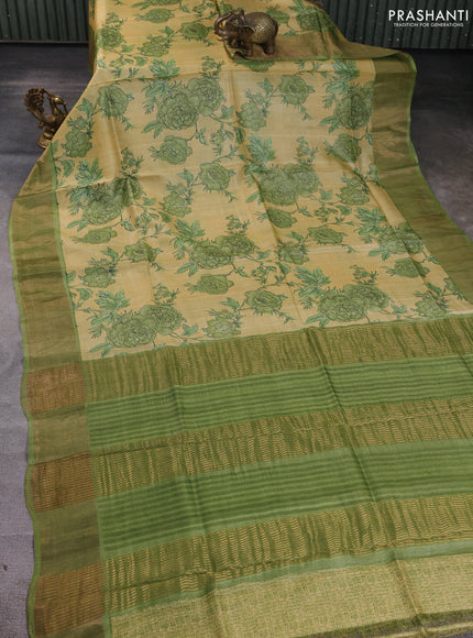 Pure tussar silk saree pale yellow and green with allover floral prints and zari woven border