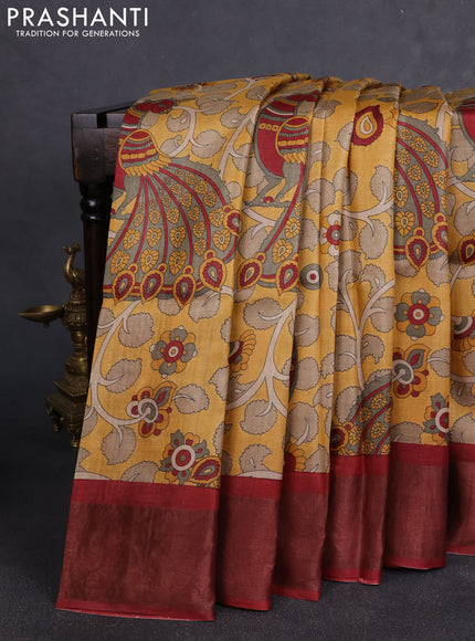 Pure tussar silk saree mustard yellow and maroon with allover kalamkari prints and zari woven border