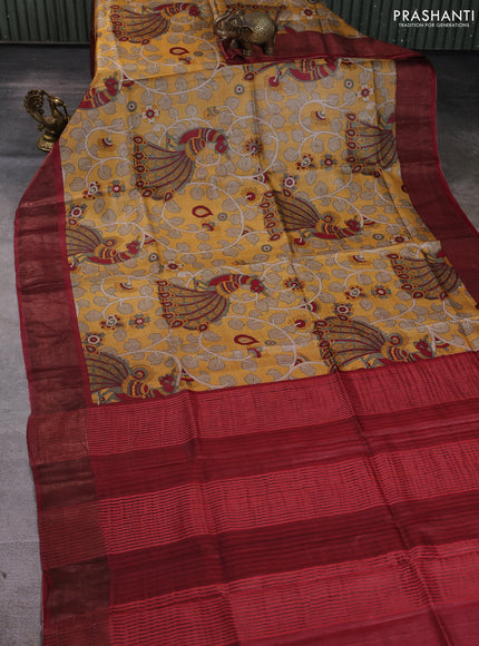Pure tussar silk saree mustard yellow and maroon with allover kalamkari prints and zari woven border