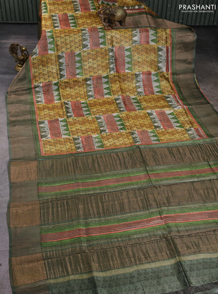 Pure tussar silk saree multi colour and pastel green with allover prints and zari woven border