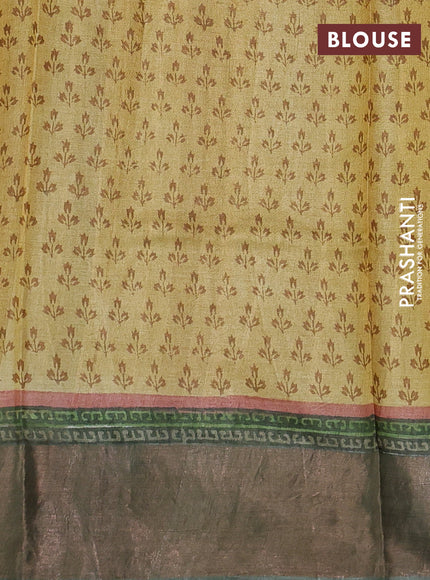Pure tussar silk saree multi colour and pastel green with allover prints and zari woven border
