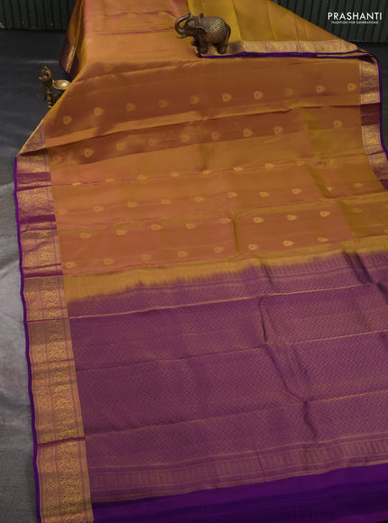 Kanchipuram silk saree dual shade of mustard and violet with zari woven buttas and zari woven border