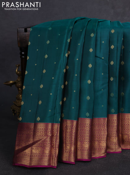 Kanchipuram silk saree peacock green and magenta pink with zari woven buttas and zari woven border