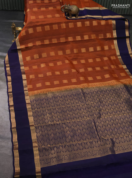 Kanchipuram silk saree rust shade and navy blue with allover zari weaves & box type buttas and rettapet zari woven border