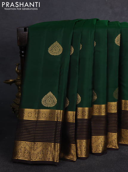 Kanchipuram silk saree green and coffee brown with allover zari woven buttas and long rich zari woven border