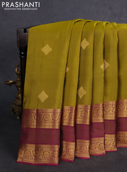 Kanchipuram silk saree mehendi green and magenta pink with allover zari woven buttas and long rich zari woven border