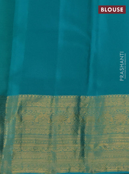 Kanchipuram silk saree light green and teal blue with allover zari woven buttas and long rich zari woven border